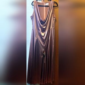 La'Tiste Sleeveless Pearlized Rose colored one piece with a belt.